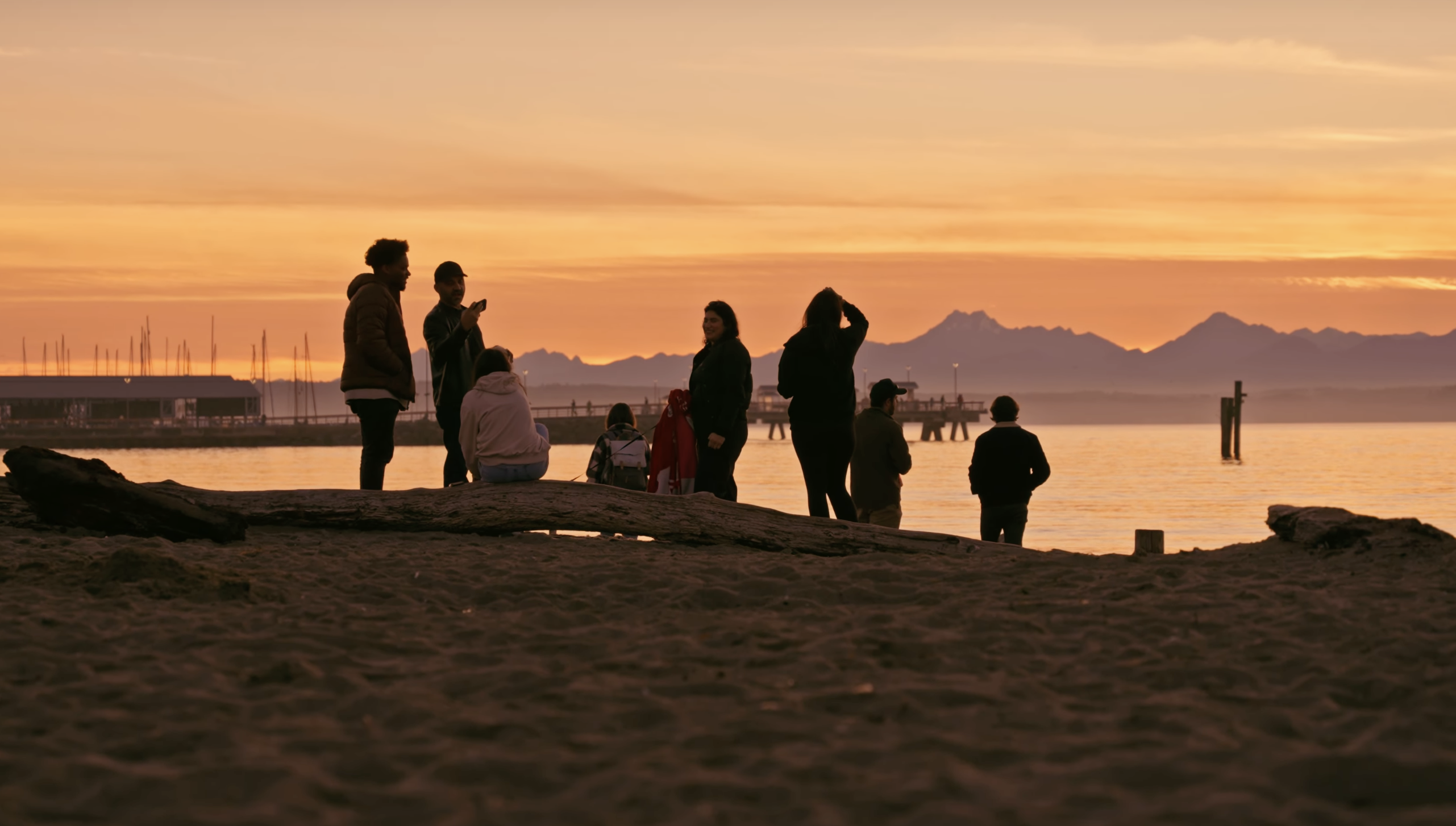 sunset over mountains at beach